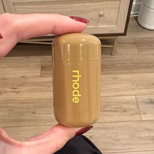 RHODE tanline pocket blush